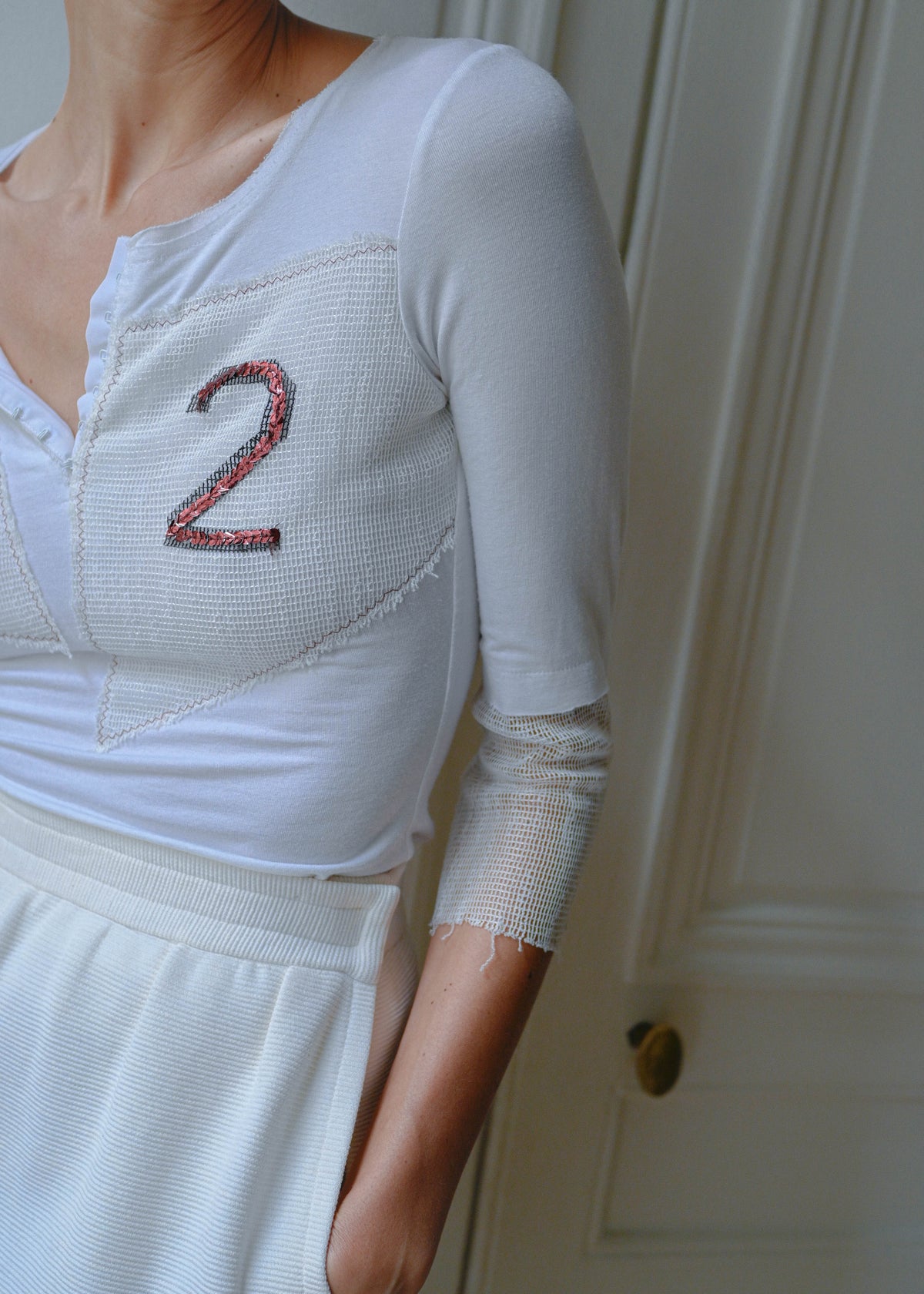 Vintage white sequin number 32 jersey top, close-up of the sequin number 2, TURN Paris