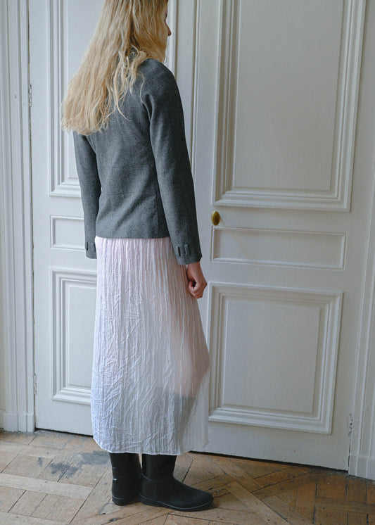 Vintage Kostas Murkudis grey tailored jacket worn with a white maxi skirt, back view, TURN Paris