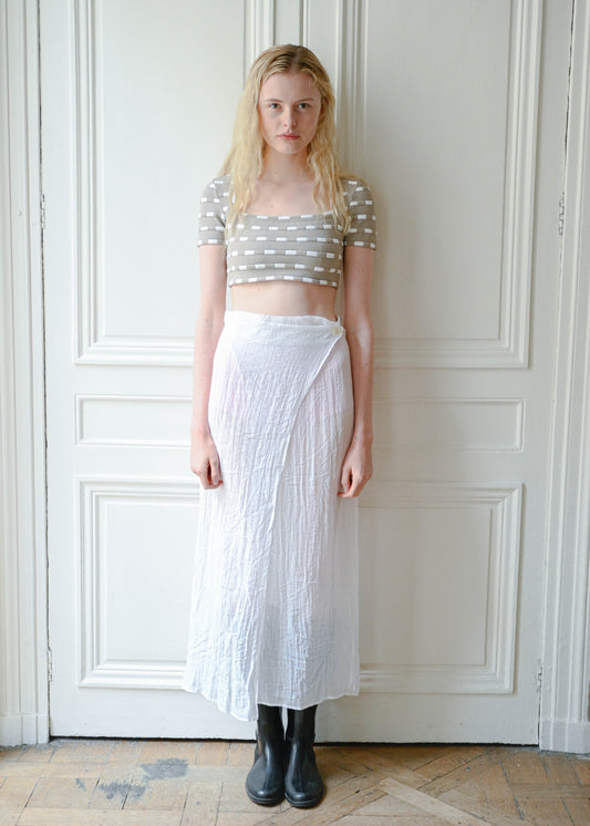 Vintage white sheer maxi wrap skirt, worn with a cropped knit top, detail, TURN Paris