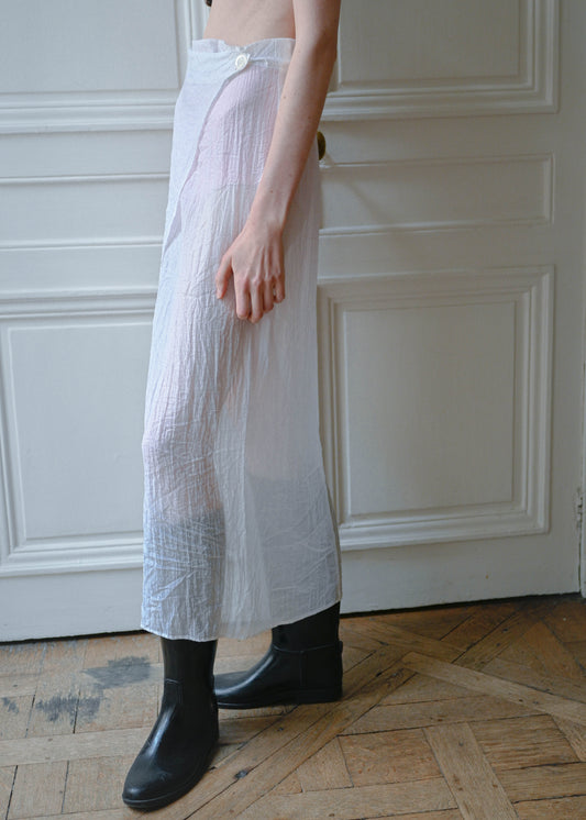 Vintage white sheer maxi wrap skirt, worn with a cropped knit top, side view, TURN Paris