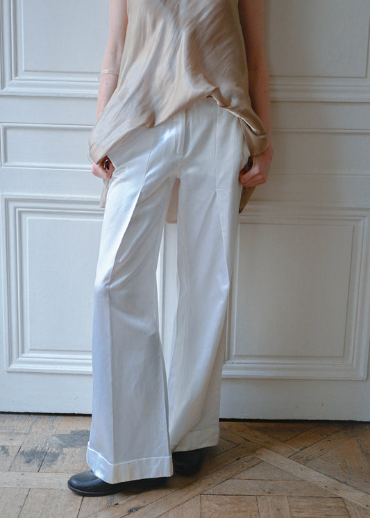Vintage white satin straight leg trousers, worn with a beige satin camisole, detail, TURN Paris