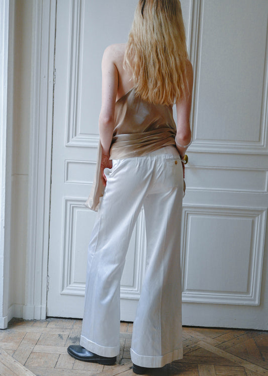 Vintage white satin straight leg trousers, worn with a beige satin camisole, back view, TURN Paris