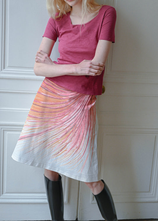 Vintage white cotton skirt with an orange and pink brushstroke print, worn with a fuchsia tee, detail, TURN Paris