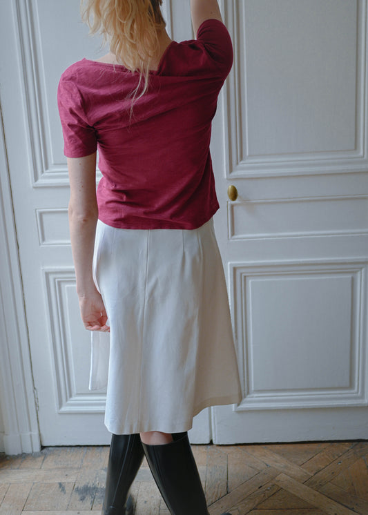 Vintage fuchsia short sleeve tee, worn with a white printed skirt, back view, TURN Paris