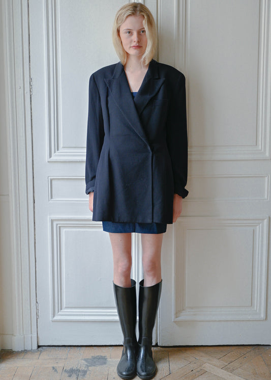 Vintage navy oversized jacket worn over a strapless denim dress, front view, TURN Paris
