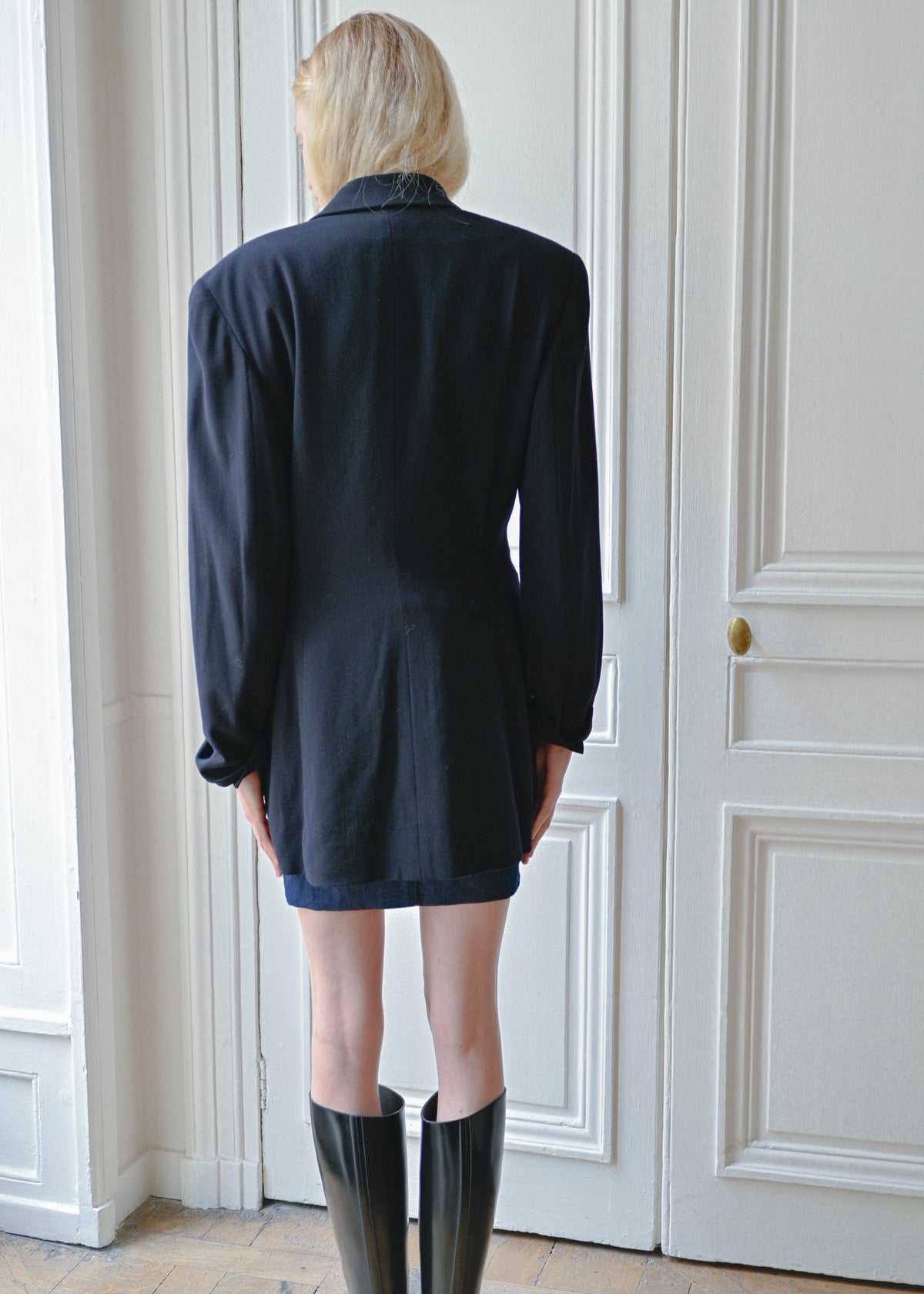Vintage navy oversized jacket worn over a strapless denim dress, back view, TURN Paris
