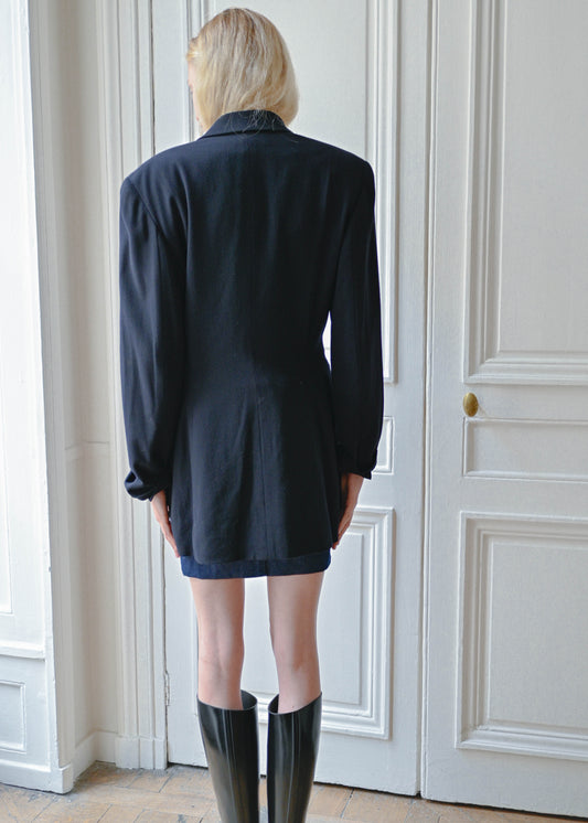 Vintage navy oversized jacket worn over a strapless denim dress, back view, TURN Paris