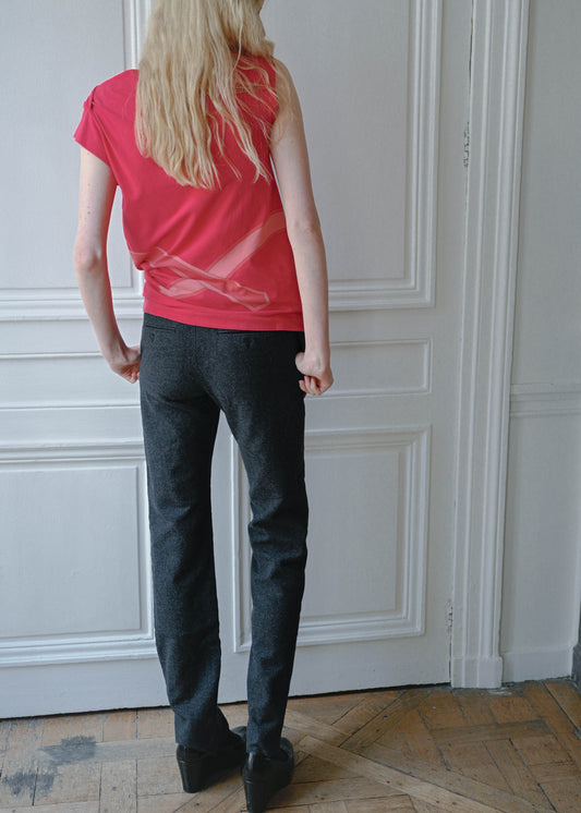 Vintage Celine grey wool trousers, worn with a red sleeveless top, close up, TURN Paris