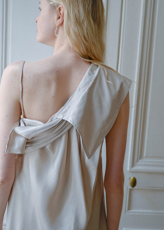 Vintage beige satin dress with spaghetti straps and a draped neckline, back view, TURN Paris