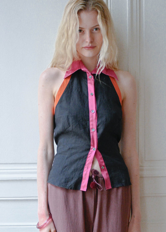 Vintage black silk sleeveless top with a pink collar, orange piping and an open back, detail, TURN Paris