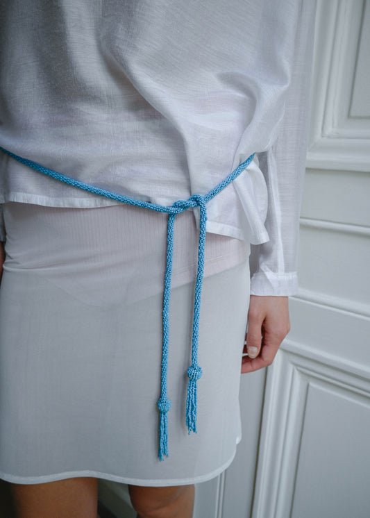 TASSLE WATER BELT