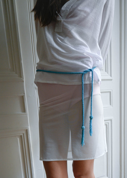 TURN PARIS MESH TUBE CUT UNDER SKIRT.

DESIGNED AS A PLAYFUL STRECH UNDER OR UPPER LAYER WITH AN ELASTIC WAISTBAND.
