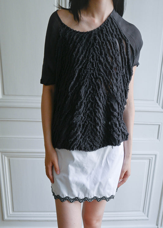 SHEER RUFFLES