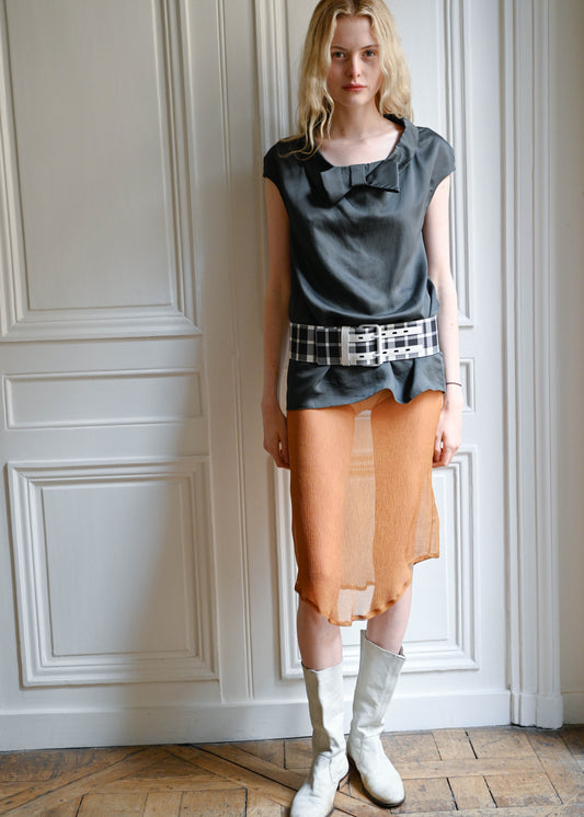 TURN Paris midi skirt in bronze silk crepe, tied at the waist with a custom-made asymmetrical pompon made in France. 100% silk.