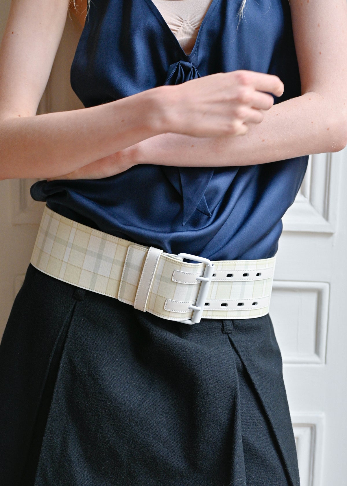 TURN Paris thick belt in a cream and white check woven fabric on a leather base, finished with a hand-painted white buckle.