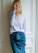 TURN Paris Tunisien-style top in lavender with long sleeves, made of Japanese lyocell, silk and wool blend with pearl buttoning.