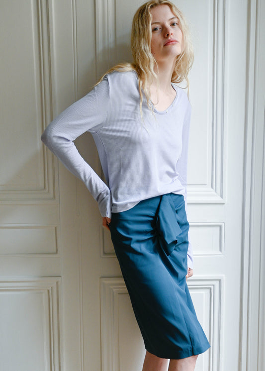 TURN Paris Tunisien-style top in lavender with long sleeves, made of Japanese lyocell, silk and wool blend with pearl buttoning.