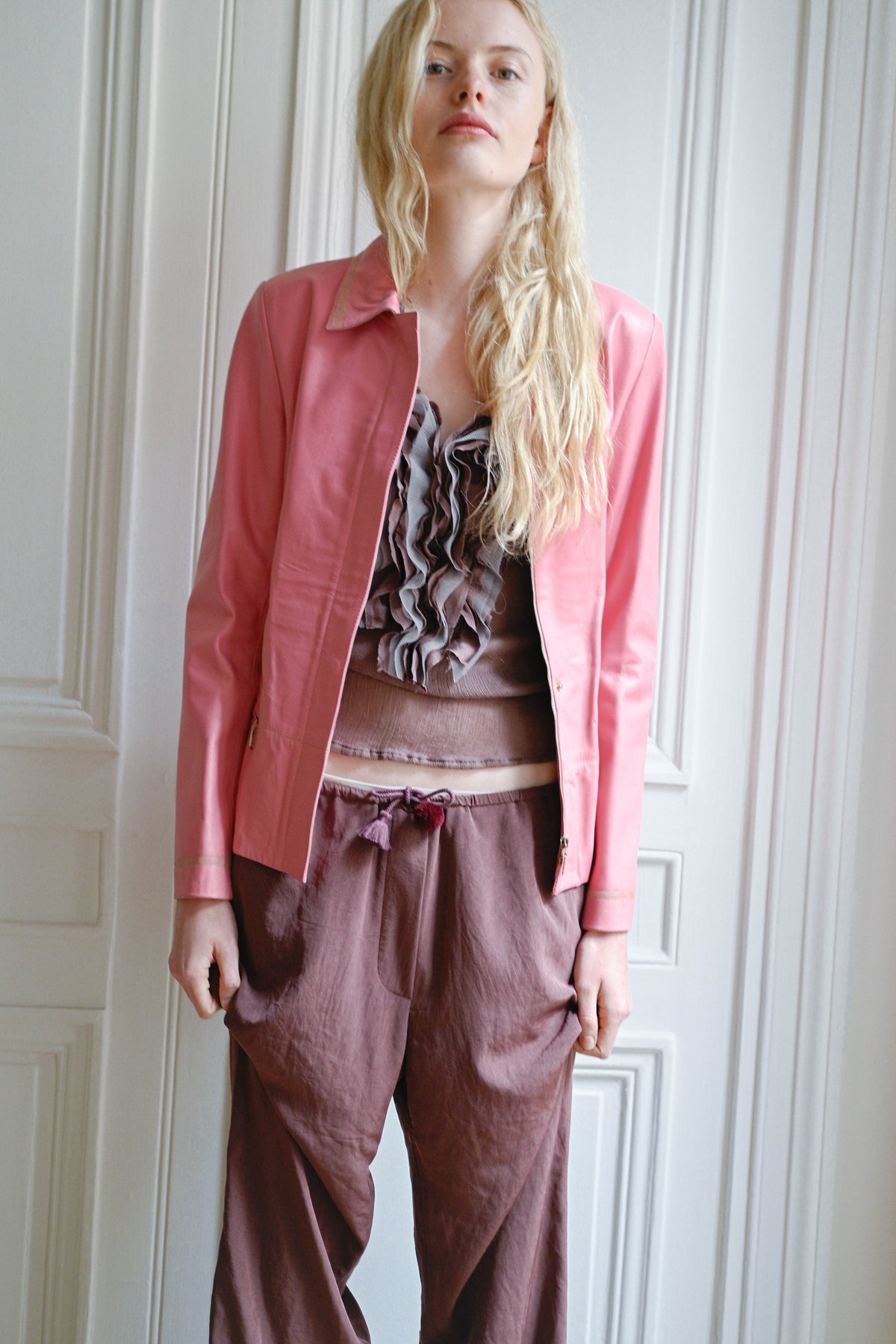 TURN Paris flowy loose pant in burgundy, tied at the waist with a custom-made asymmetrical pompon made in France.
