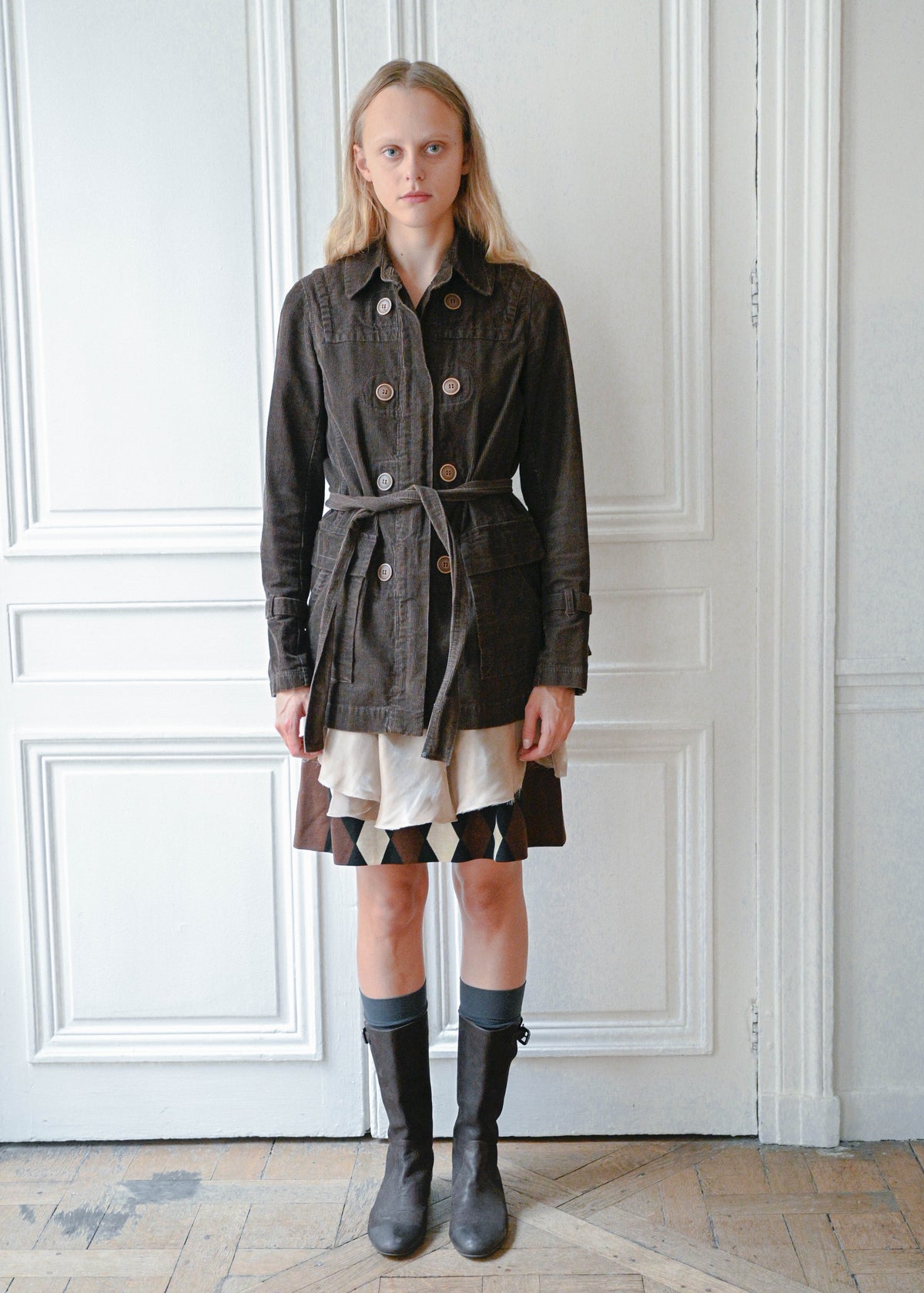 Brown velvet safari jacket worn with diagonal check wool skirt, front view