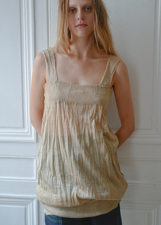 Gold textured mini dress, close-up