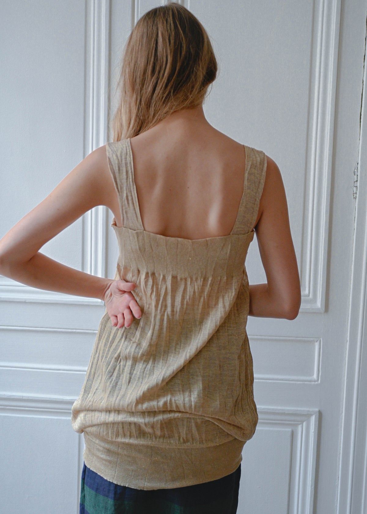 Gold textured mini dress, back view