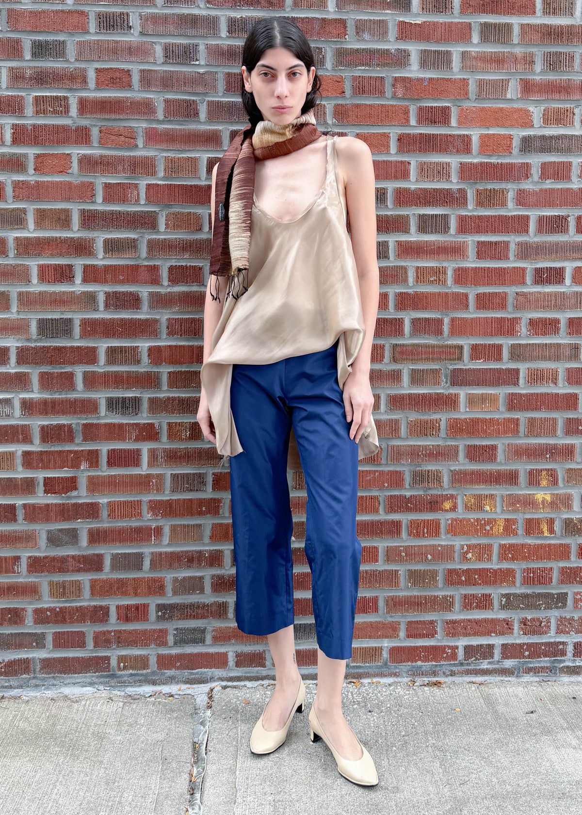 TURN Paris capri in navy silk, cut to fall below the knee for a tailored feel, with an invisible side zipper. 100% silk.