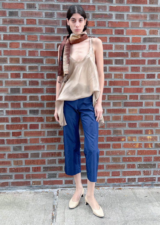 TURN Paris capri in navy silk, cut to fall below the knee for a tailored feel, with an invisible side zipper. 100% silk.