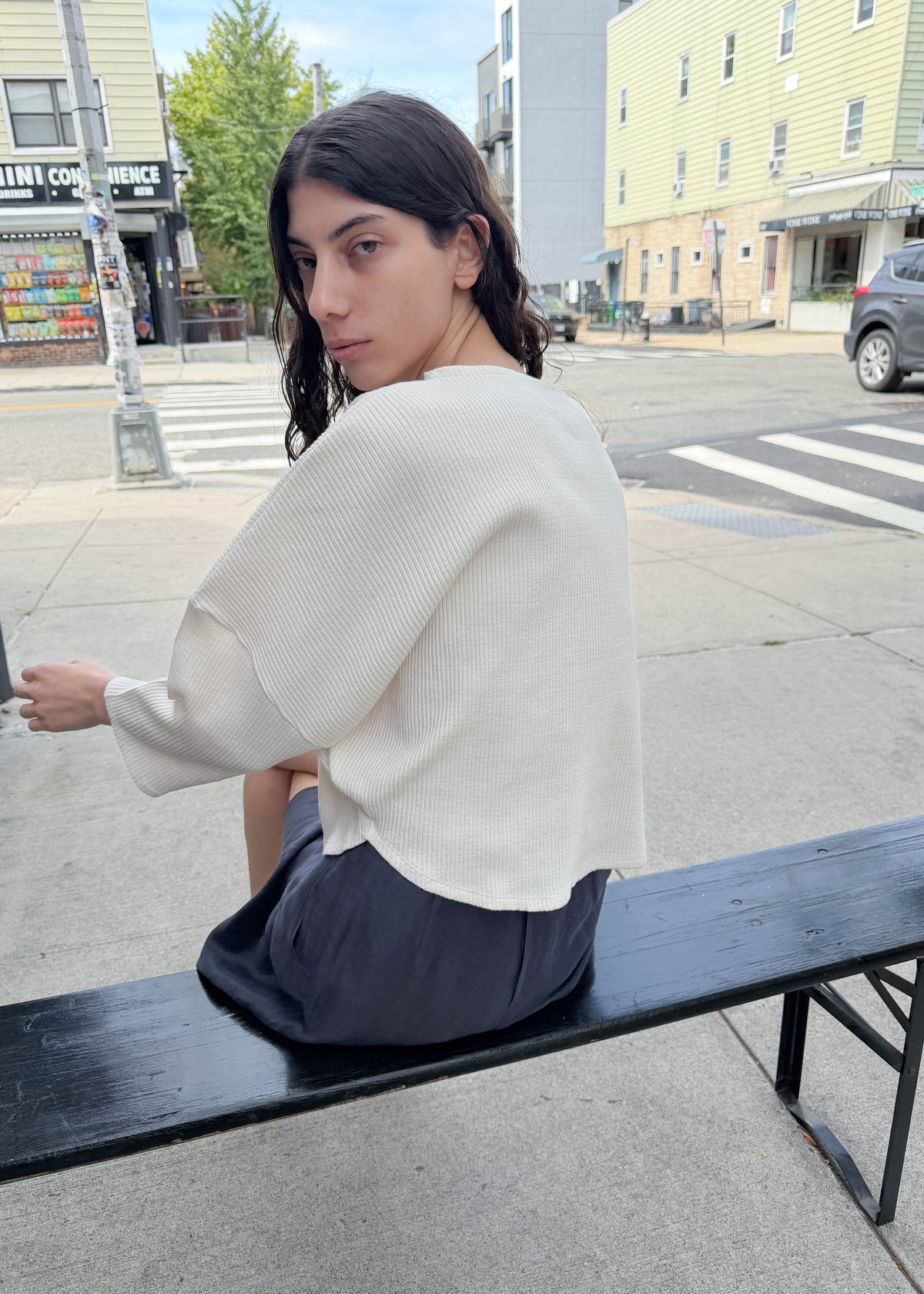 TURN Paris ribbed sweater in cream with a heart-shaped silhouette and structured shoulders to enhance posture. Made in Portugal.
