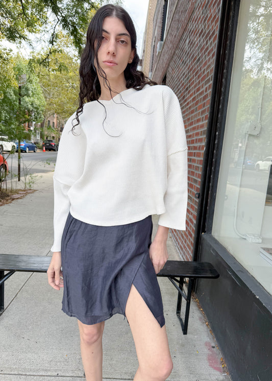 TURN Paris ribbed sweater in cream with a heart-shaped silhouette and structured shoulders to enhance posture. Made in Portugal.