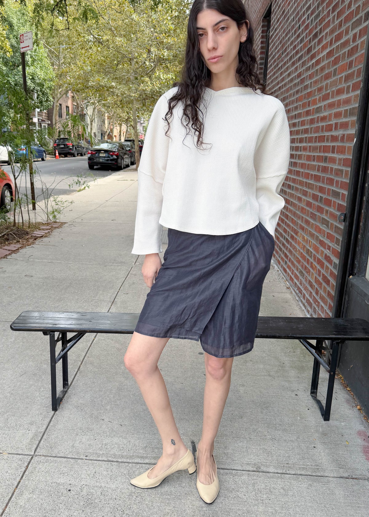 TURN Paris ribbed sweater in cream with a heart-shaped silhouette and structured shoulders to enhance posture. Made in Portugal.