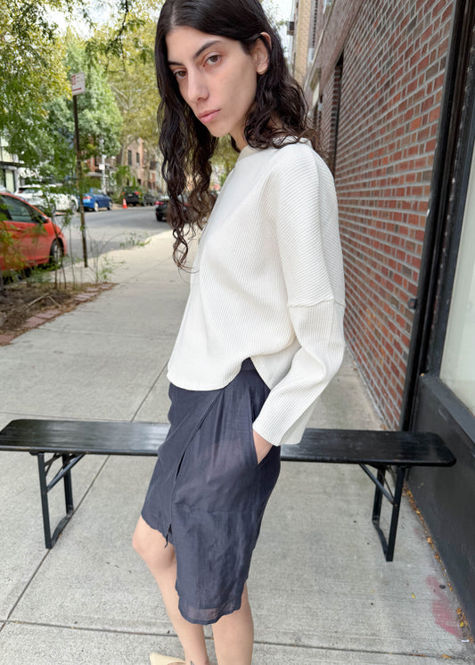 TURN Paris ribbed sweater in cream with a heart-shaped silhouette and structured shoulders to enhance posture. Made in Portugal.