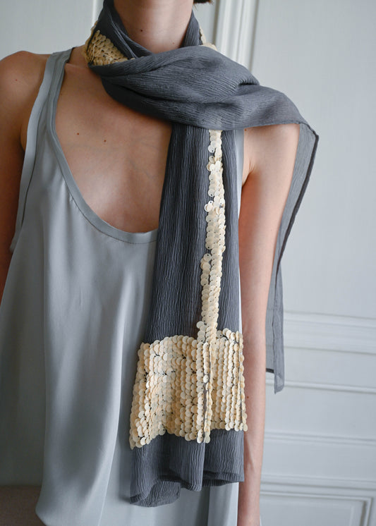 Grey silk scarf by TURN Paris wrapped at the neck, embroidered beige sequins